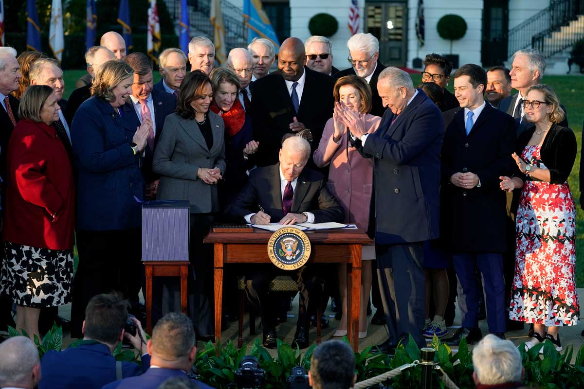 President Joe Biden signs the Bipartisan Infrastructure Investment and Jobs Act